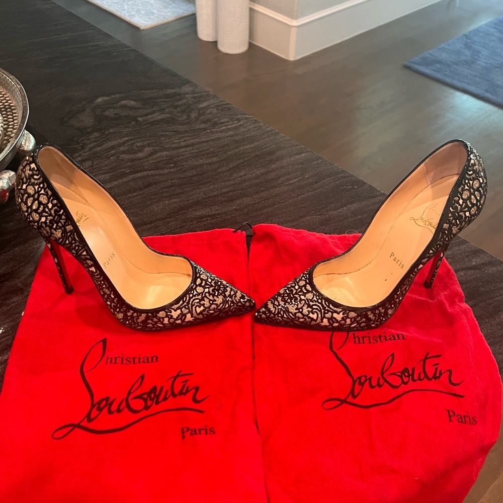 Christian Louboutin size 37.5 purchased at Neiman Marcus red bottom protectors